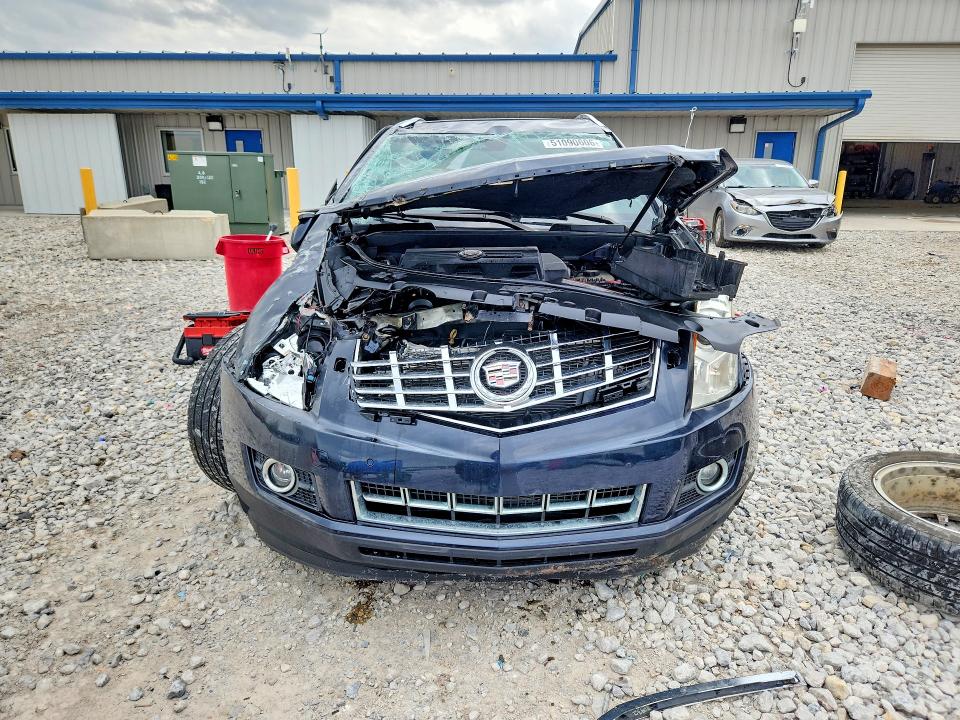 2014 Cadillac Srx VIN 3GYFNFE31ES583433 COPART salvage auction — ROLLOVER, MI - CERTIFICATE OF TITLE, sold $300 on 2026-07-02 (photo 5)