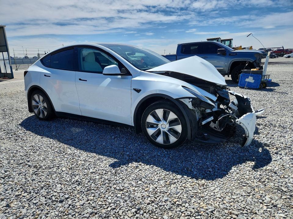 2023 Tesla Model y VIN 7SAYGDEE6PF760359 COPART salvage auction — FRONT END, CO - PUBLIC - SALVAGE TITLE, sold $5,900 on 2026-07-07 (photo 4)