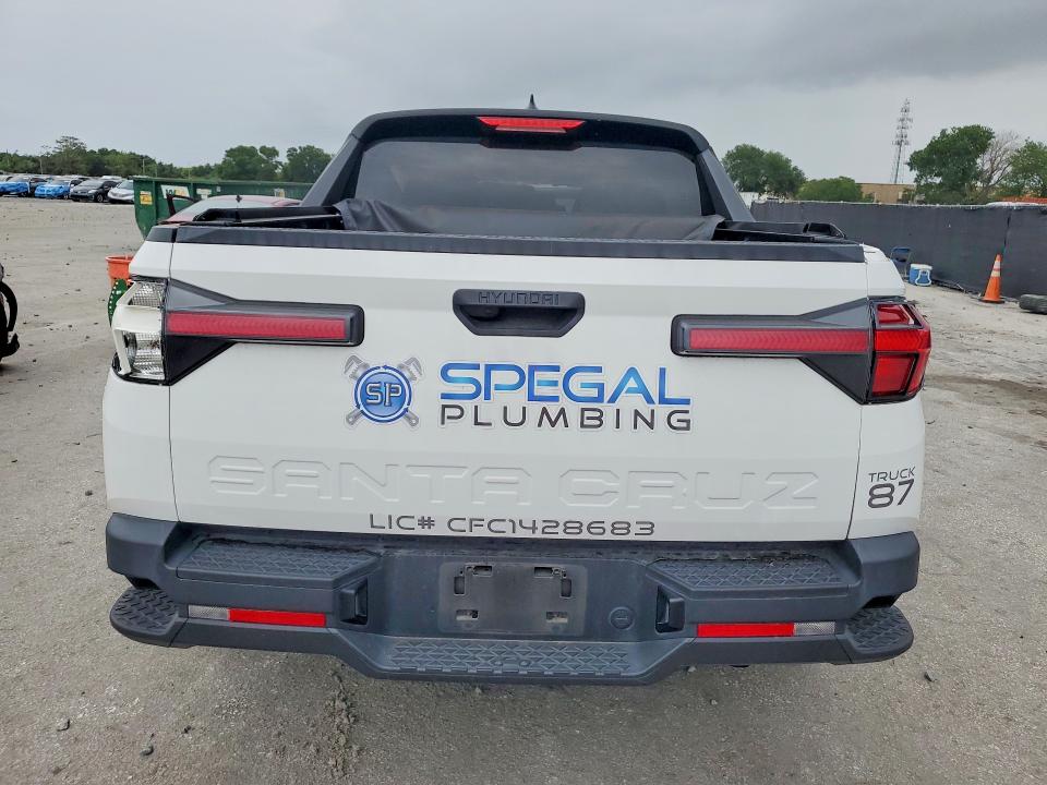 2024 Hyundai Santa cruz VIN 5NTJB4AE3RH088513 COPART salvage auction — SIDE, Fl - Certificate Of Destruction, sold $3,800 on 2026-07-15 (photo 6)