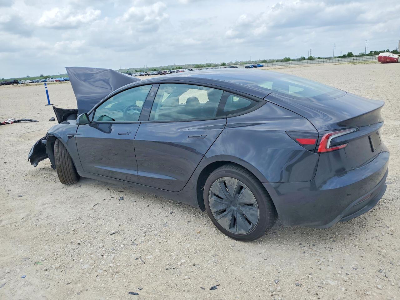 2025 Tesla Model 3 VIN 5YJ3E1EA7SF002242 COPART salvage auction — Front End, TX - SALVAGE VEHICLE TITLE, sold $8,400 on 2026-06-25 (photo 2)