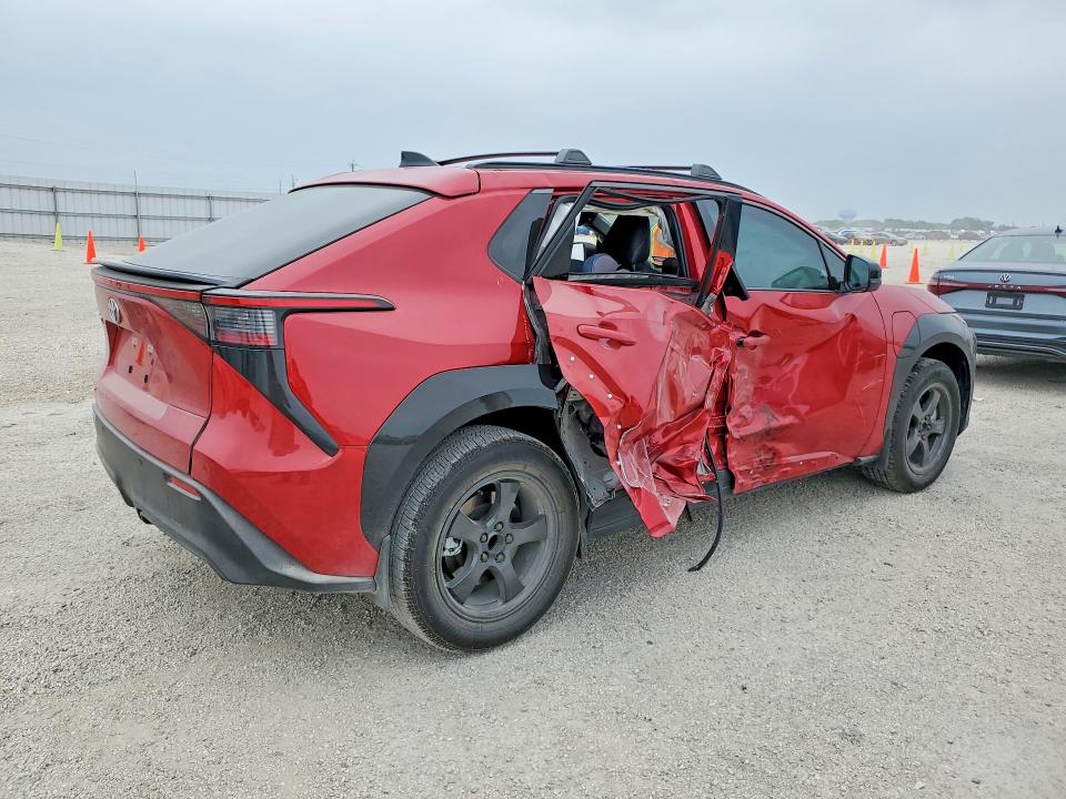 2026 Toyota Bz4x VIN JTMBFAEB1TA004001 COPART salvage auction — SIDE, Tx - Salvage Vehicle Title, sold $6,700 on 2026-07-16 (photo 3)