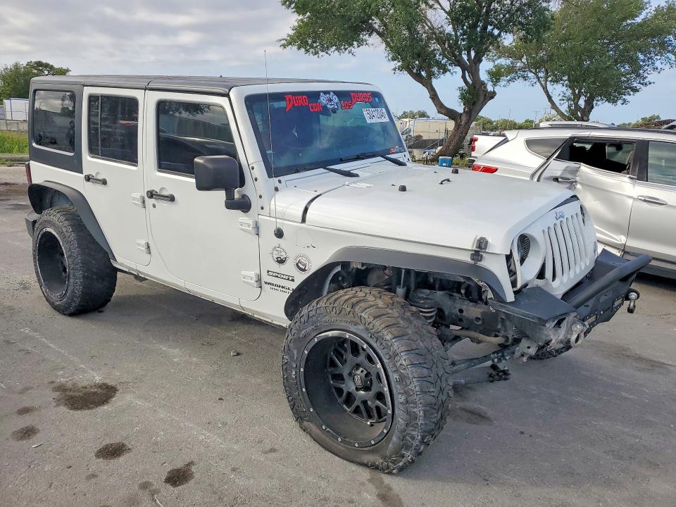 2016 Jeep Wrangler / VIN 1C4BJWDG7GL169506 COPART salvage auction — FRONT END, Fl - Cert Of Title Slvg Rebuildable, sold $3,200 on 2026-07-09 (photo 4)