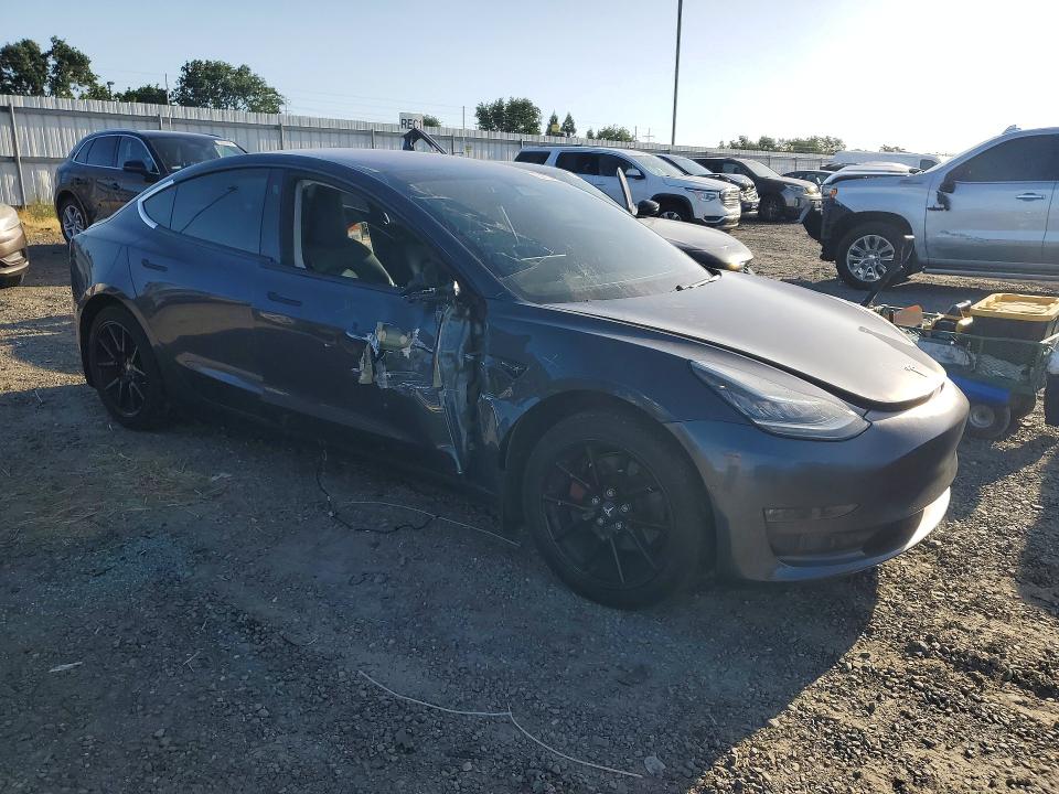 2017 Tesla Model 3 VIN 5YJ3E1EA9HF002218 COPART salvage auction — SIDE, Ca - Salvage Certificate, sold $4,250 on 2026-07-02 (photo 4)