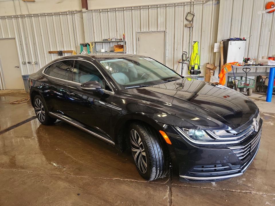 2019 Volkswagen Arteon VIN WVWBR7AN6KE009308 COPART salvage auction — REAR END, WI - CERTIFICATE OF TITLE, sold $8,200 on 2026-07-20 (photo 4)