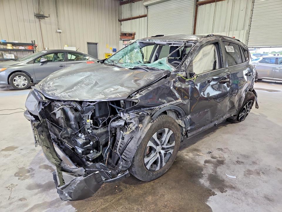 2016 Toyota Rav 4 VIN JTMZFREV7GD084951 COPART salvage auction — ROLLOVER, La - Certificate Of Destruction, sold $1,550 on 2026-07-22 (photo 1)