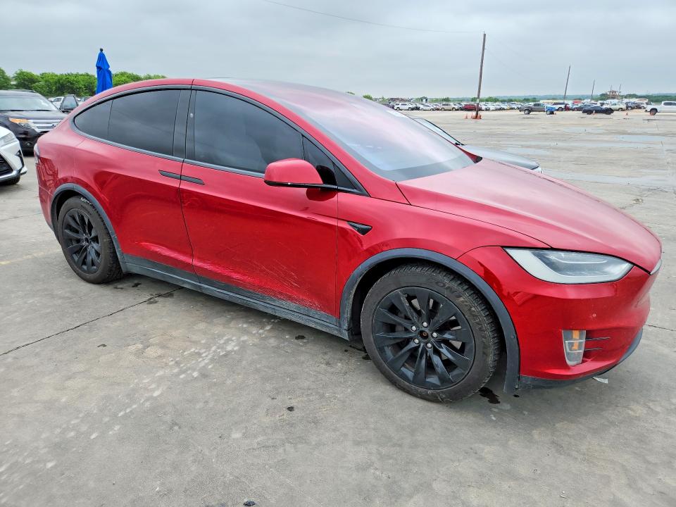 2017 Tesla Model x VIN 5YJXCDE28HF060211 COPART salvage auction — HAIL, Tx - Certificate Of Title, sold $12,100 on 2026-07-09 (photo 4)