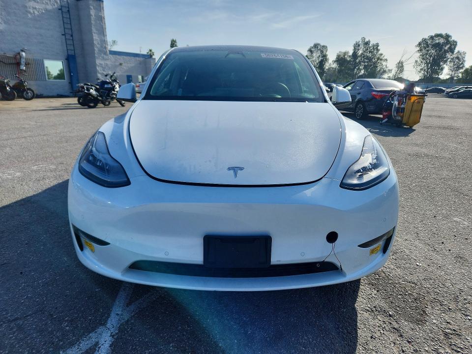 2021 Tesla Model y VIN 5YJYGAEE3MF283963 COPART salvage auction — SIDE, Ca - Salvage Certificate, sold $9,400 on 2026-07-28 (photo 5)