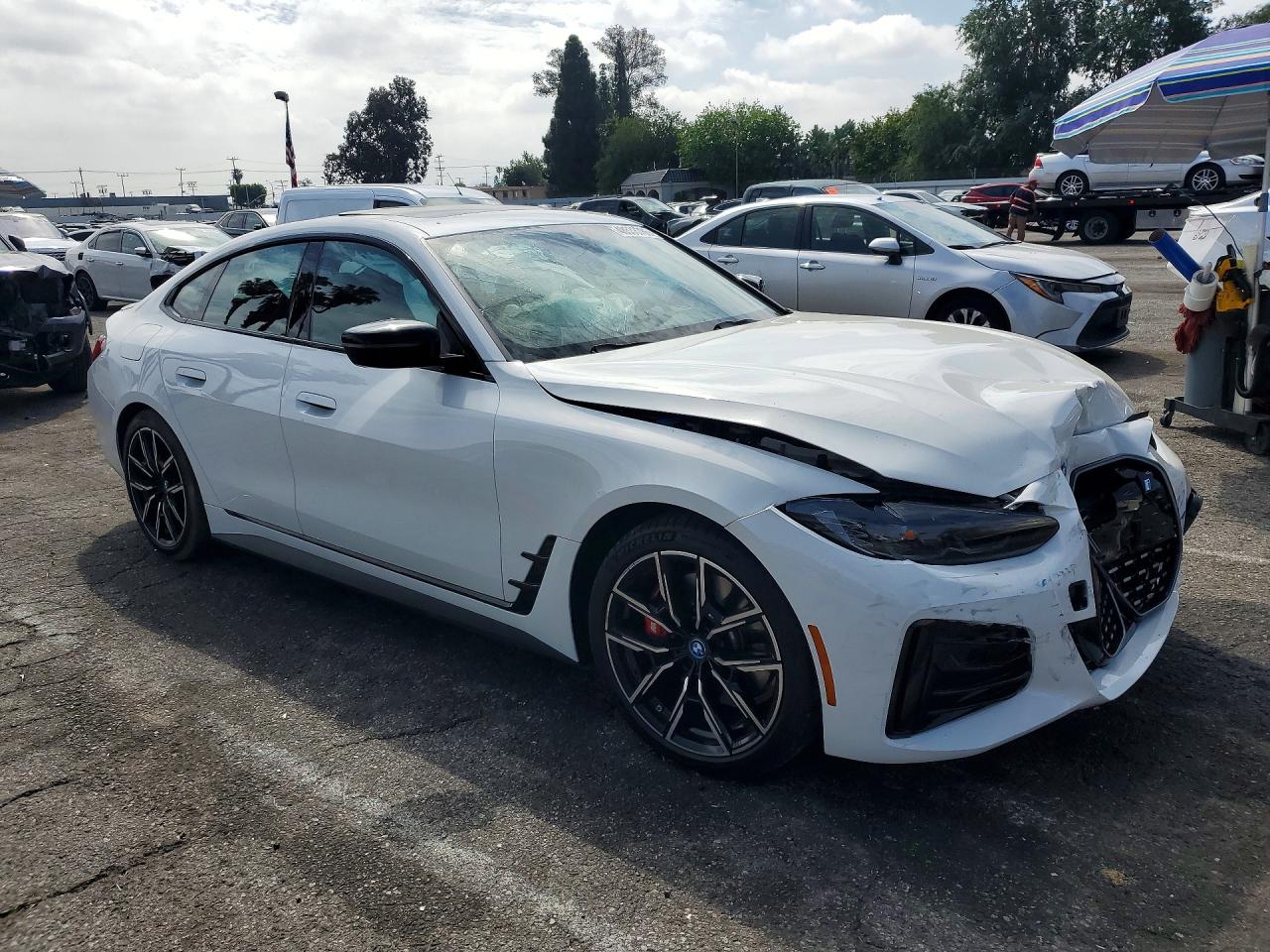 2024 BMW i4 VIN WBY83FB02RFT23615 COPART salvage auction — Front End, ID - SALVAGE CERTIFICATE OF TITLE, sold $15,600 on 2026-07-10 (photo 4)