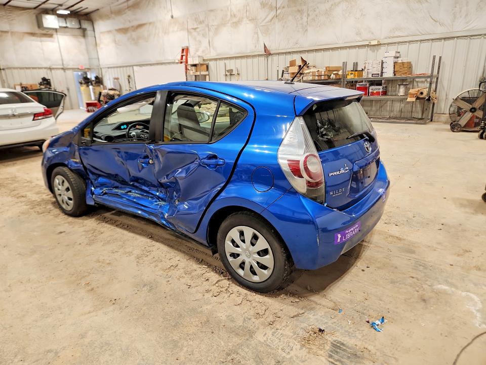 2012 Toyota Prius c VIN JTDKDTB31C1515352 COPART salvage auction — SIDE, Wi - Junked Vehicle Bill Of Sale, sold $650 on 2026-07-08 (photo 2)