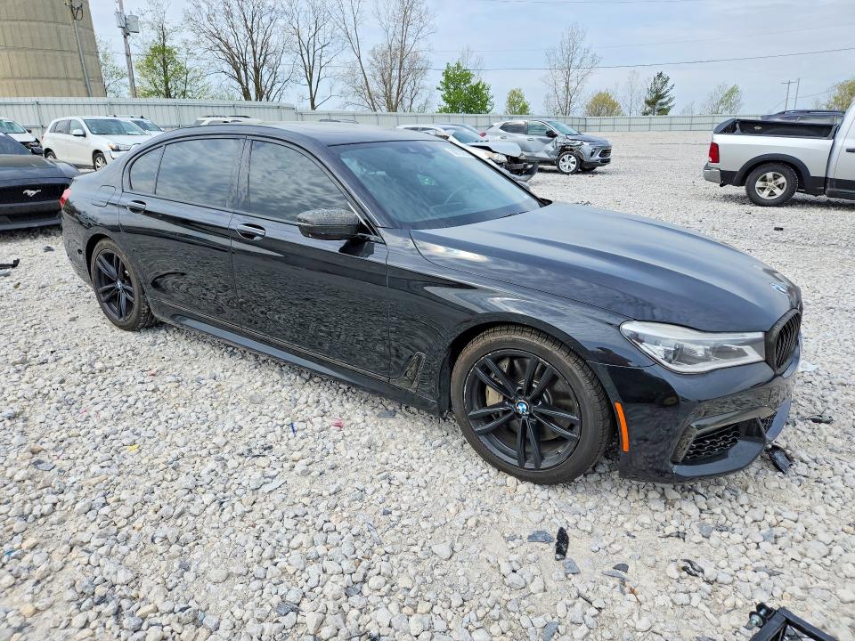 2016 BMW 7er VIN WBA7F2C56GGE12389 COPART salvage auction — WATER/FLOOD, Mi - Cert Of Title-Flood Vehicle, sold $5,700 on 2026-07-02 (photo 4)