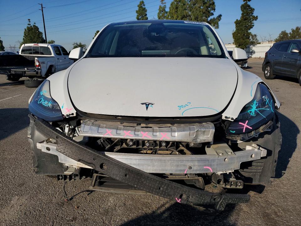 2022 Tesla Model y VIN 7SAYGDEE7NF408260 COPART salvage auction — FRONT END, Ca - Salvage Certificate, sold $11,000 on 2026-07-30 (photo 5)