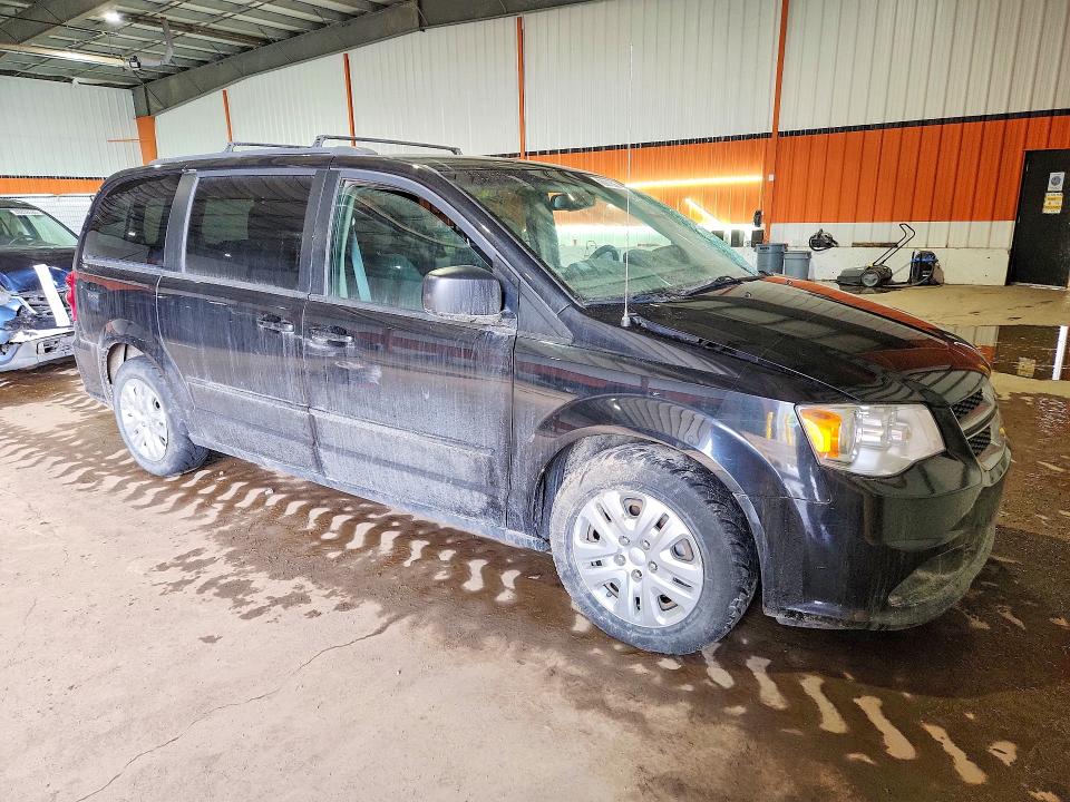 2017 Dodge Caravan VIN 2C4RDGBG2HR702188 COPART salvage auction — SIDE, Salvage Title, sold $875 on 2026-08-04 (photo 4)