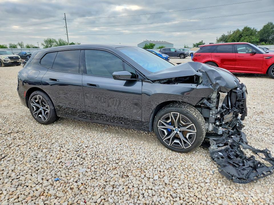 2024 BMW Ix VIN WB523CF01RCR56071 COPART salvage auction — FRONT END, Salvage Title, sold $21,600 on 2026-07-16 (photo 4)
