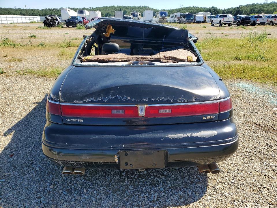 1995 Lincoln Mark series VIN 1LNLM91V4SY760187 COPART salvage auction — ALL OVER, Ca - Dis/Dlr/Exp Lien Papers-Salv, sold $50 on 2026-07-08 (photo 6)