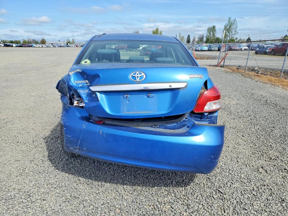 2010 Toyota Yaris VIN JTDBT4K36A4064150 COPART salvage auction — REAR END, Or - Salvage Title Certificate, sold $200 on 2026-07-07 (photo 6)