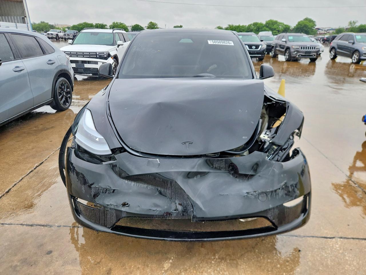2025 Tesla Model Y VIN 7SAYGDEE9SA344604 COPART salvage auction — Front End, TX - SALVAGE VEHICLE TITLE, sold $9,900 on 2026-07-09 (photo 5)