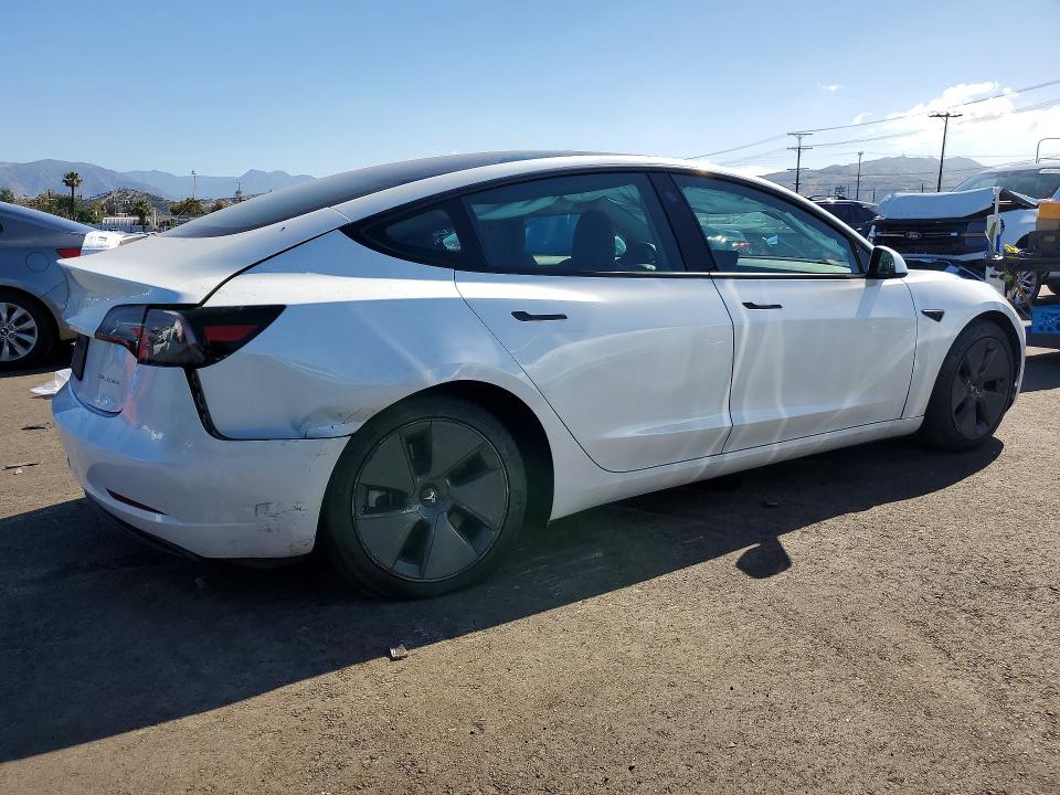 2023 Tesla Model 3 VIN 5YJ3E1EBXPF695517 COPART salvage auction — REAR END, Salvage Title, sold $9,200 on 2026-07-15 (photo 3)