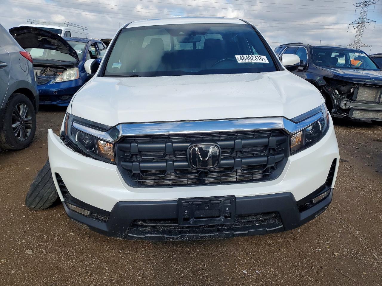 2024 Honda Ridgeline VIN 5FPYK3F52RB014098 COPART salvage auction — Side, IL - SALVAGE CERTIFICATE, sold $10,200 on 2026-07-02 (photo 5)