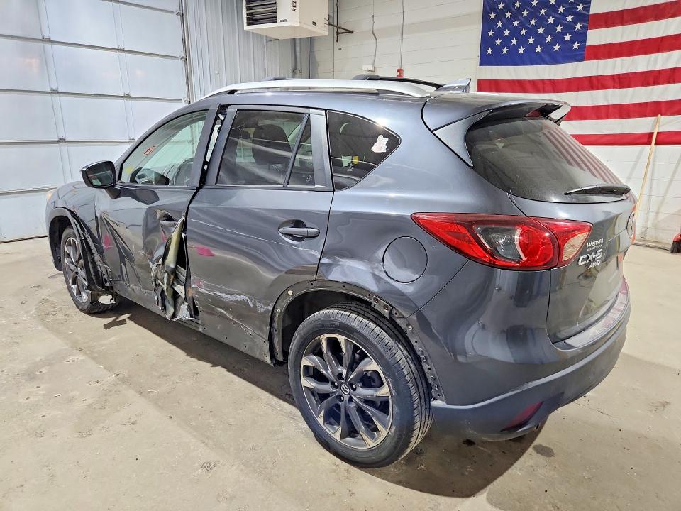 2016 Mazda Cx-5 VIN JM3KE4DY1G0795935 COPART salvage auction — SIDE, Nh - Cert Of Title-Salvage, sold $2,200 on 2026-07-28 (photo 2)