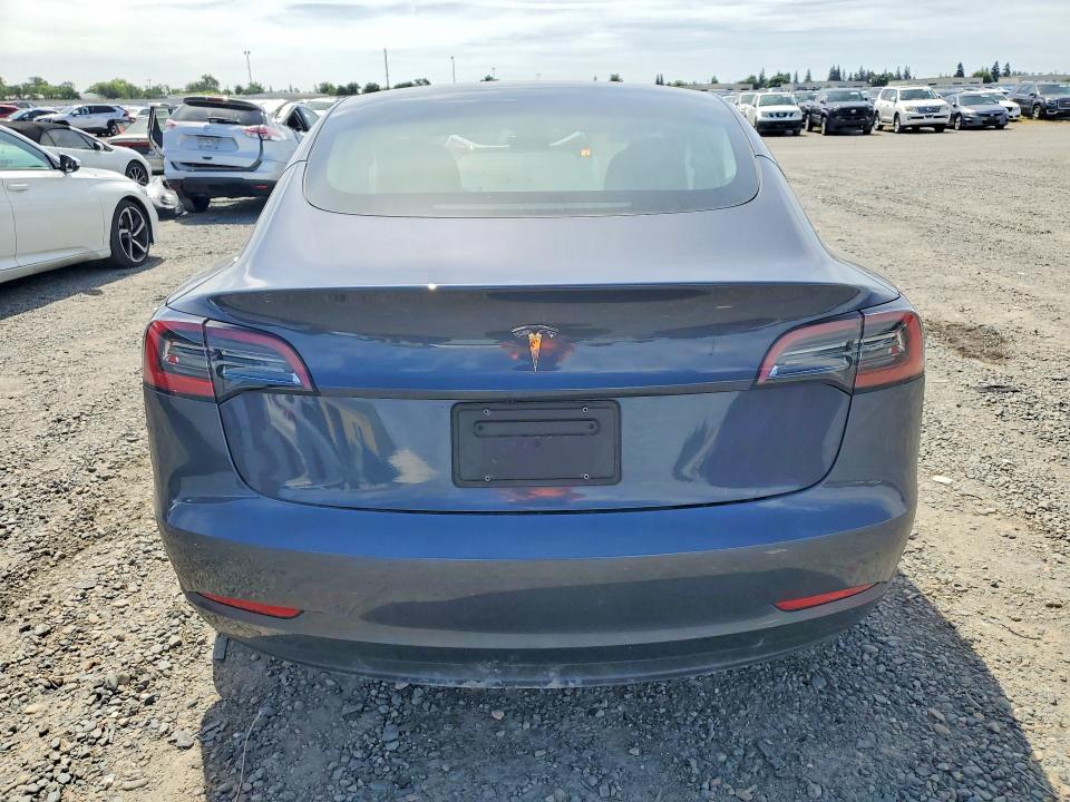 2023 Tesla Model 3 VIN 5YJ3E1EA9PF590524 COPART salvage auction — SIDE, Ca - Salvage Certificate, sold $8,700 on 2026-09-01 (photo 6)