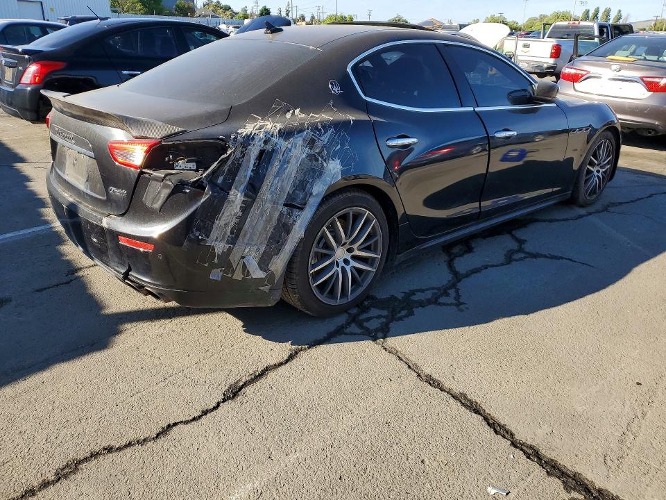2014 Maserati Ghibli VIN ZAM57RTA9E1085914 COPART salvage auction — SIDE, Fl - Dis/Dlr/Exp Only Clean Title, sold $2,100 on 2026-07-31 (photo 3)