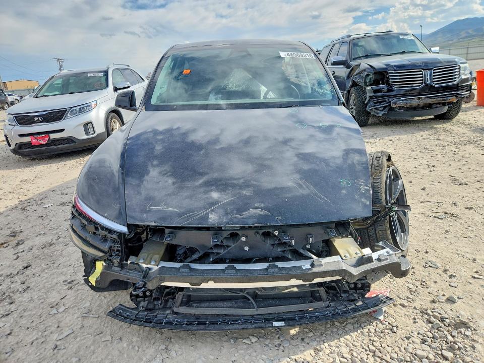 2026 Tesla Model y VIN 7SAYGDED0TF383478 COPART salvage auction — SIDE, Ut - Salvage Certificate, sold $14,900 on 2026-07-31 (photo 5)