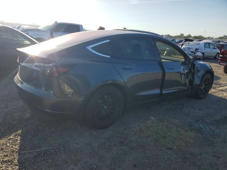 2017 Tesla Model 3 VIN 5YJ3E1EA9HF002218 COPART salvage auction — SIDE, Ca - Salvage Certificate, sold $4,250 on 2026-07-02 (photo 3)