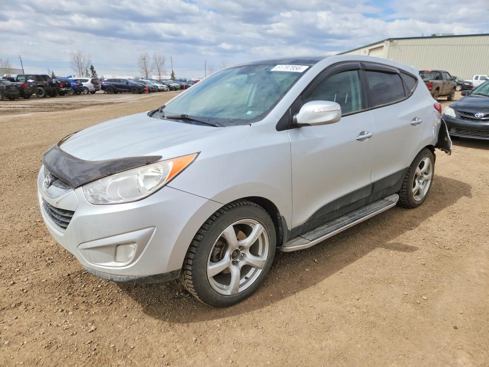 2011 Hyundai Tucson VIN KM8JUCAC0BU275328 COPART salvage auction — REAR END, AB - BOS - SALVAGE, sold $275 on 2026-07-28 (photo 1)