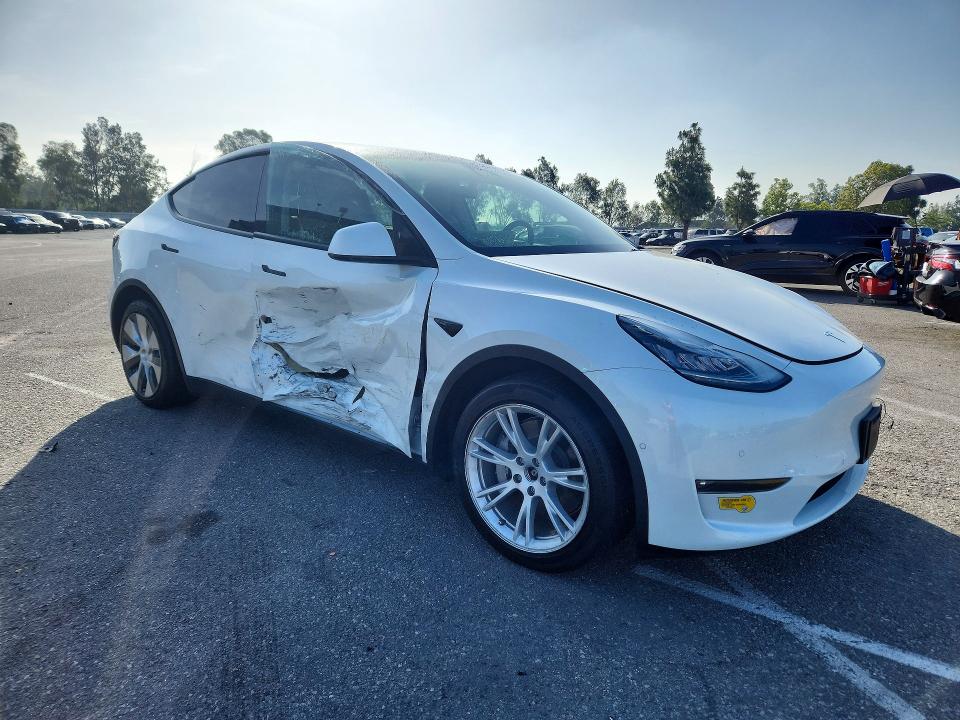 2021 Tesla Model y VIN 5YJYGAEE3MF283963 COPART salvage auction — SIDE, Ca - Salvage Certificate, sold $9,400 on 2026-07-28 (photo 4)