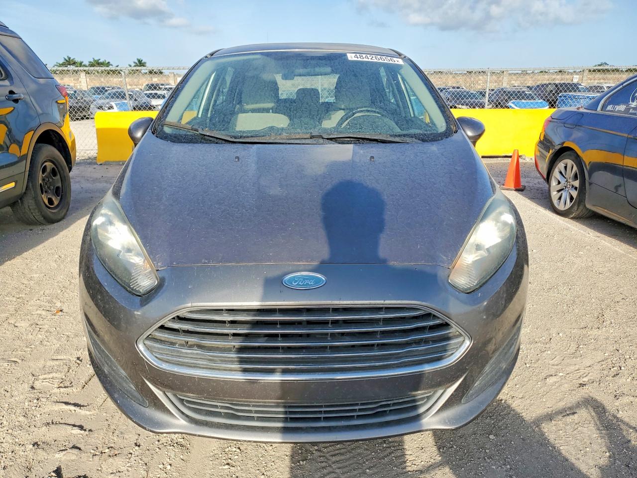 2014 Ford Fiesta VIN 3FADP4EE6EM216034 COPART salvage auction — Minor Dent/Scratches, FL - CERTIFICATE OF TITLE, sold $275 on 2026-07-01 (photo 5)