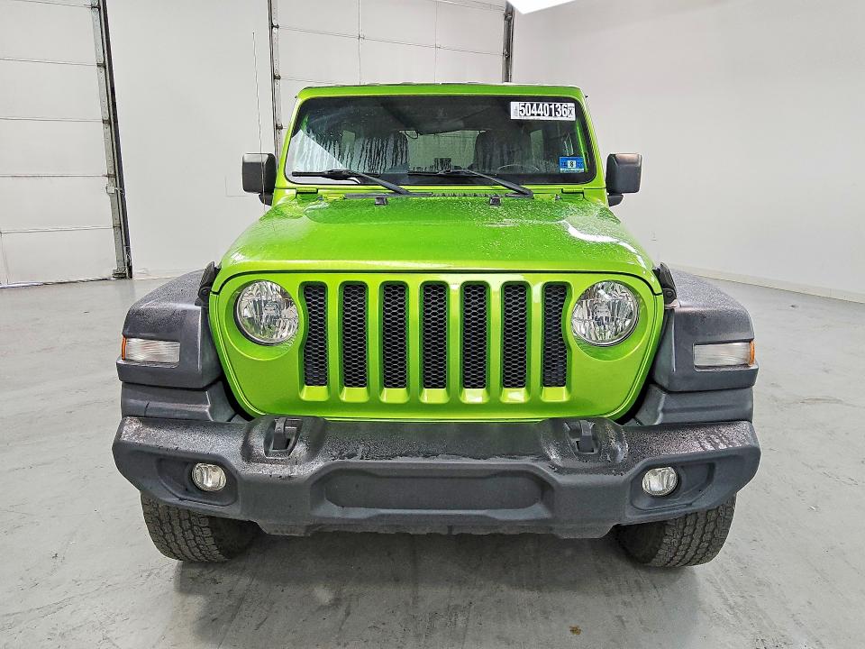 2018 Jeep Wrangler unlimited VIN 1C4HJXDG7JW273239 COPART salvage auction — NORMAL WEAR, MI - CERTIFICATE OF TITLE, sold $9,000 on 2026-08-18 (photo 5)