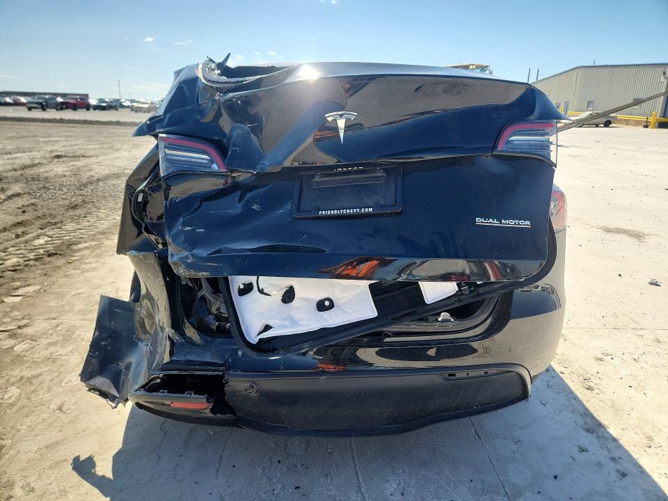 2024 Tesla Model y VIN 7SAYGDEF7RF037406 COPART salvage auction — REAR END, Tx - Certificate Of Title, sold $5,500 on 2026-07-28 (photo 6)