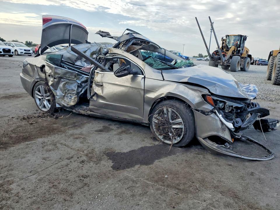 2013 Volkswagen Passat cc VIN WVWRN7AN7DE526968 COPART salvage auction — ROLLOVER, Salvage Title, sold $425 on 2026-07-13 (photo 4)
