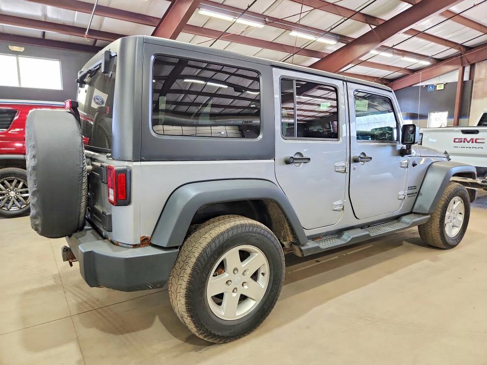 2013 Jeep Wrangler unlimited VIN 1C4BJWDGXDL699433 COPART salvage auction — MINOR DENT/SCRATCHES, Vt - Certificate Of Title, sold $5,900 on 2026-07-02 (photo 3)