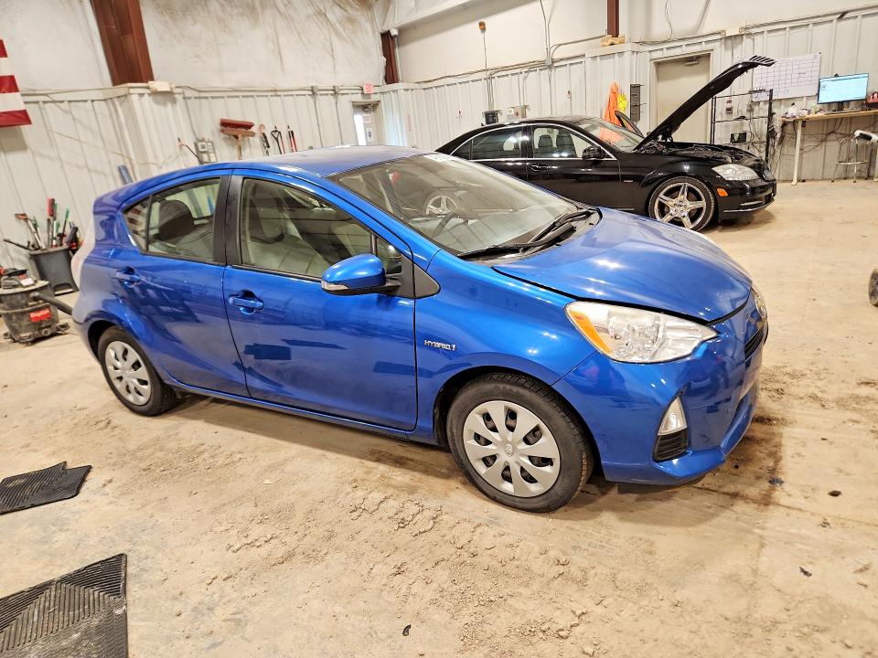 2012 Toyota Prius c VIN JTDKDTB31C1515352 COPART salvage auction — SIDE, Wi - Junked Vehicle Bill Of Sale, sold $650 on 2026-07-08 (photo 4)