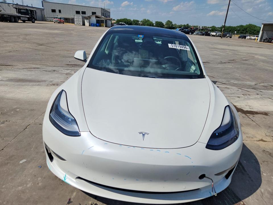 2021 Tesla Model 3 VIN 5YJ3E1EA5MF053693 COPART salvage auction — SIDE, Tx - Salvage Vehicle Title, sold $6,500 on 2026-07-09 (photo 5)