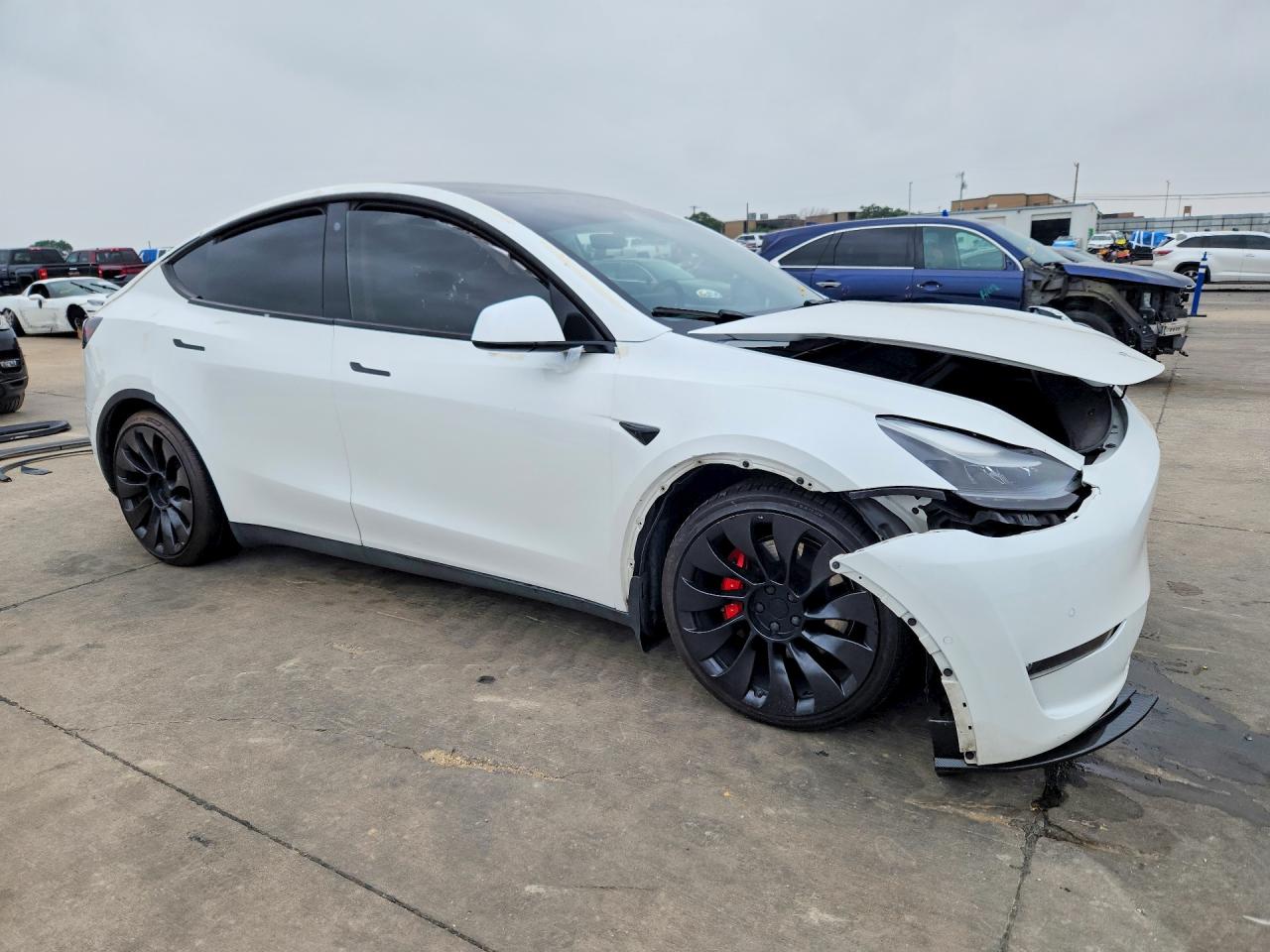 2022 Tesla Model Y VIN 7SAYGDEF0NF452268 COPART salvage auction — Front End, TX - CERTIFICATE OF TITLE, sold $6,900 on 2026-07-09 (photo 4)