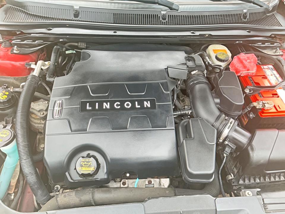 2013 Lincoln Mks VIN 1LNHL9DK8DG606388 COPART salvage auction — NORMAL WEAR, Tx - Certificate Of Title (P), sold $2,750 on 2026-07-09 (photo 7)