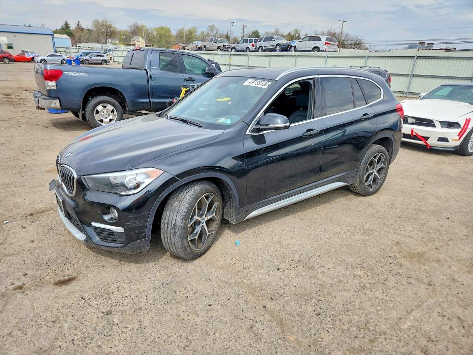 2018 BMW X1 VIN WBXHT3C33J5L34225 — COPART salvage auction photo