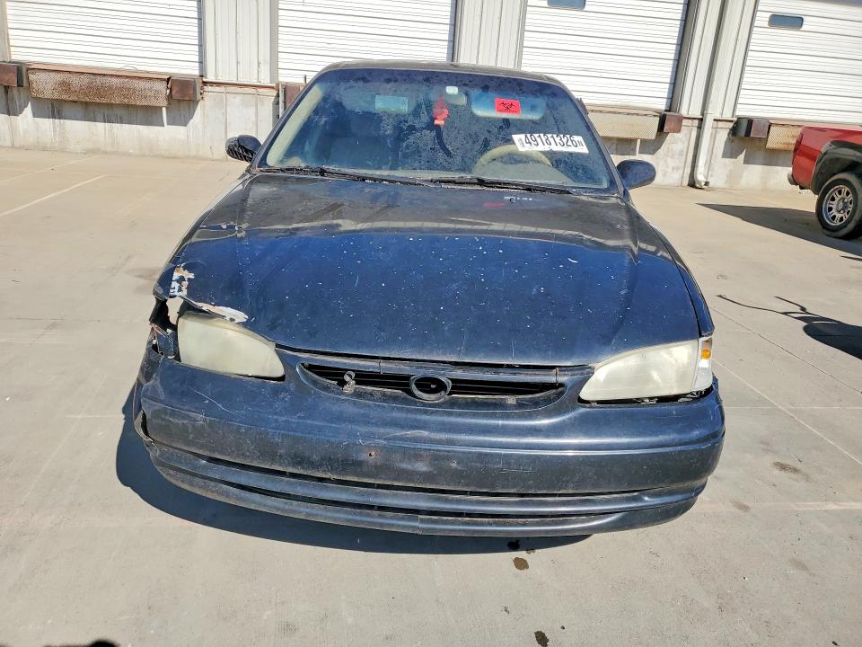 2000 Toyota Corolla VIN 2T1BR12E9YC283898 COPART salvage auction — FRONT END, Tx - Salvage Vehicle Title, sold $350 on 2026-07-09 (photo 5)