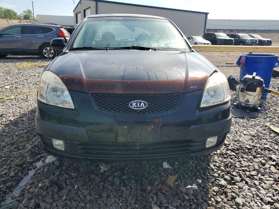 2009 Kia Rio VIN KNADE223096556726 COPART salvage auction — SIDE, Wv - Salvage Certificate, sold $225 on 2026-07-28 (photo 5)