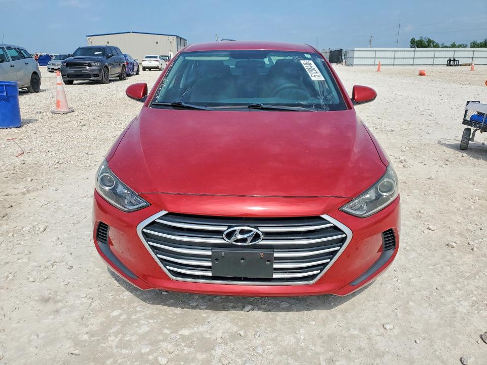 2017 Hyundai Elantra VIN 5NPD74LFXHH154007 COPART salvage auction — SIDE, Tx - Salvage Vehicle Title, sold $675 on 2026-07-30 (photo 5)