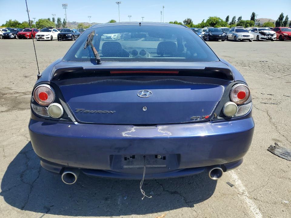 2003 Hyundai Tiburon VIN KMHHN65F03U017880 COPART salvage auction — ENGINE BURN, Ca - Salvage Certificate, sold $200 on 2026-07-10 (photo 6)