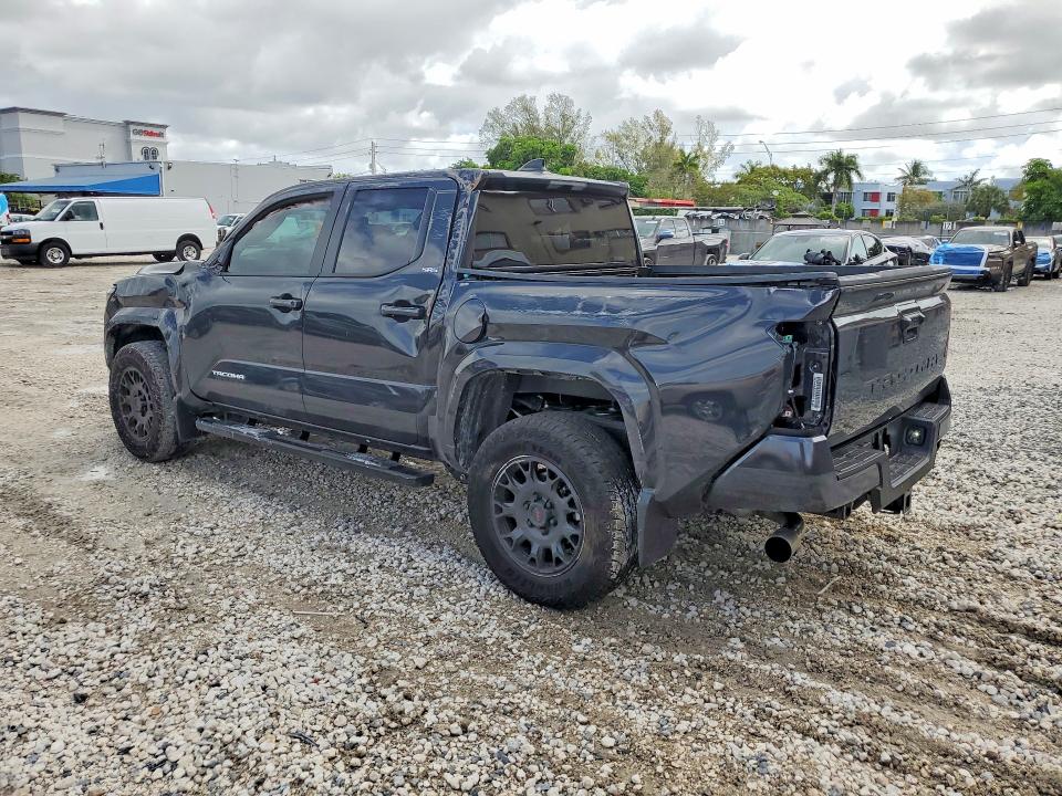 2026 Toyota Tacoma VIN 3TMKB5FN2TM059880 COPART salvage auction — SIDE, Fl - Cert Of Title Slvg Rebuildable, sold $16,700 on 2026-07-02 (photo 2)
