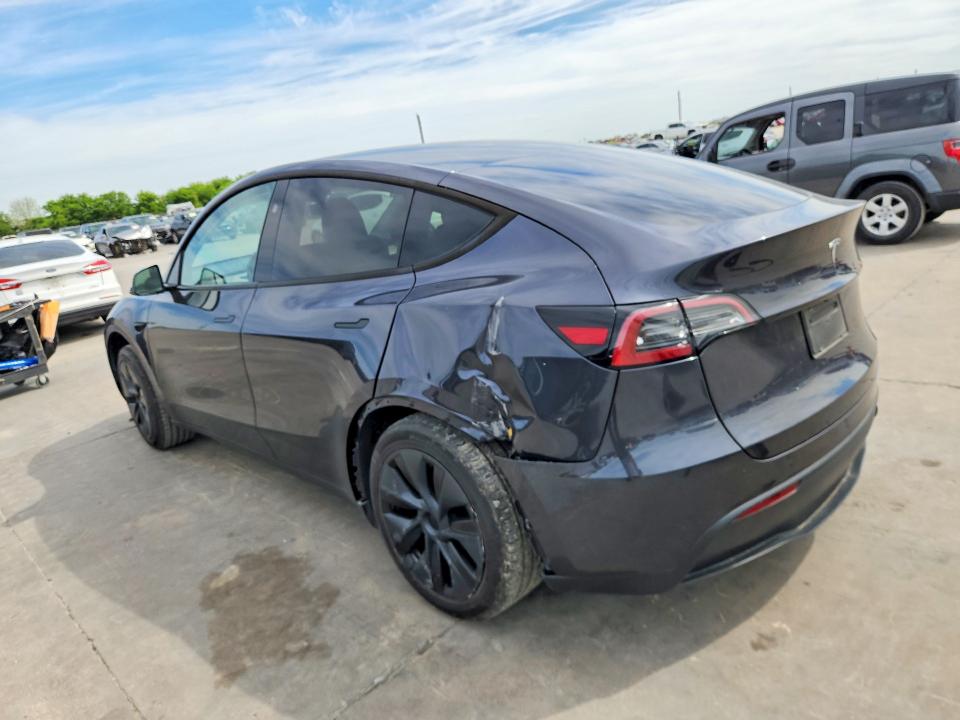 2025 Tesla Model y VIN 7SAYGDED1SA376194 COPART salvage auction — SIDE, Tx - Certificate Of Title, sold $16,100 on 2026-07-16 (photo 2)