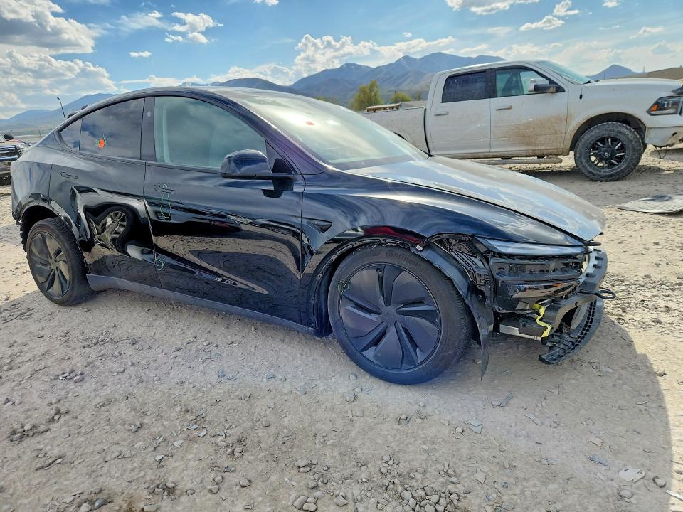 2026 Tesla Model y VIN 7SAYGDED0TF383478 COPART salvage auction — SIDE, Ut - Salvage Certificate, sold $14,900 on 2026-07-31 (photo 4)