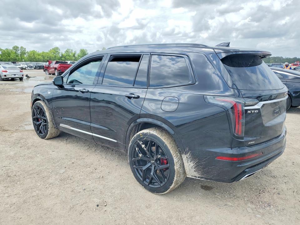 2023 Cadillac Xt6 VIN 1GYKPGRS5PZ135086 COPART salvage auction — WATER/FLOOD, Tx - Salvage Title-Flood Damage, sold $15,400 on 2026-07-14 (photo 2)