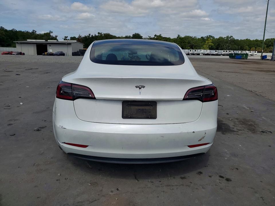 2023 Tesla VIN 5YJ3E1EA5PF558721 COPART salvage auction — SIDE, Fl - Certificate Of Destruction, sold $7,800 on 2026-07-15 (photo 6)