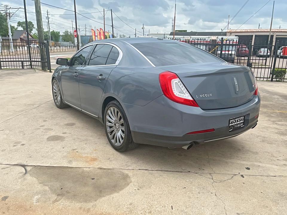 2013 Lincoln Mks VIN 1LNHL9DK8DG606388 COPART salvage auction — NORMAL WEAR, Tx - Certificate Of Title (P), sold $2,750 on 2026-07-09 (photo 3)