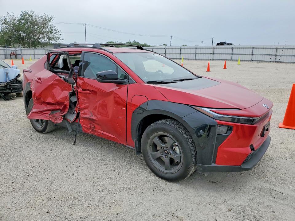 2026 Toyota Bz4x VIN JTMBFAEB1TA004001 COPART salvage auction — SIDE, Tx - Salvage Vehicle Title, sold $6,700 on 2026-07-16 (photo 4)